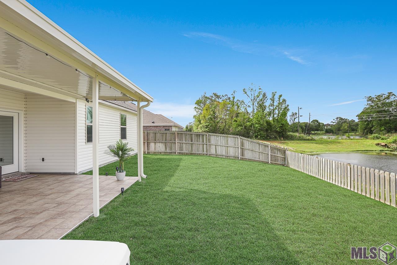 4710 Malbec Avenue Baton Rouge, LA 70817 - Photo 6 of 32 Backyard overlooking the lake