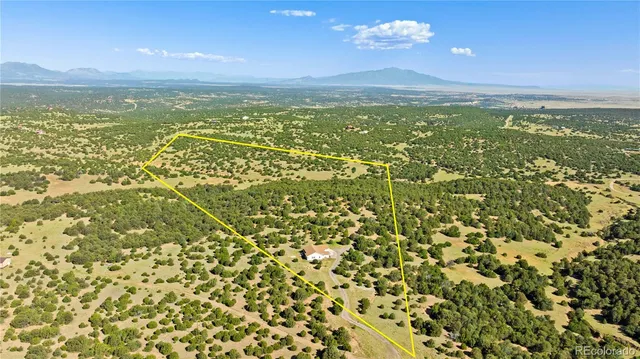a view of a city with an ocean