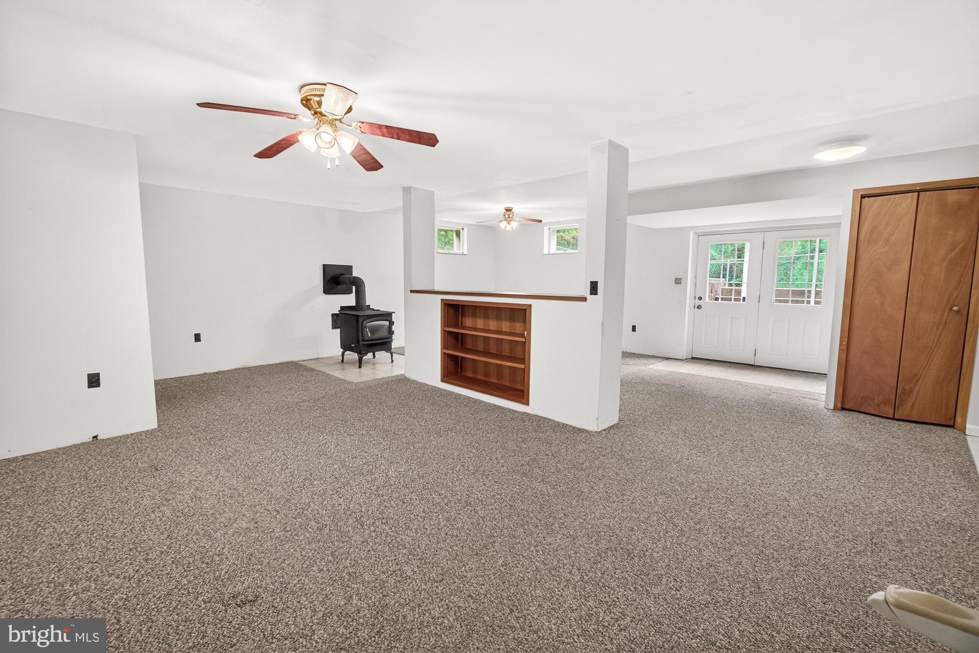 5601 Woodville Road Mount Airy, MD 21771 - Photo 36 of 54 a view of livingroom with hardwood floor and cabinet