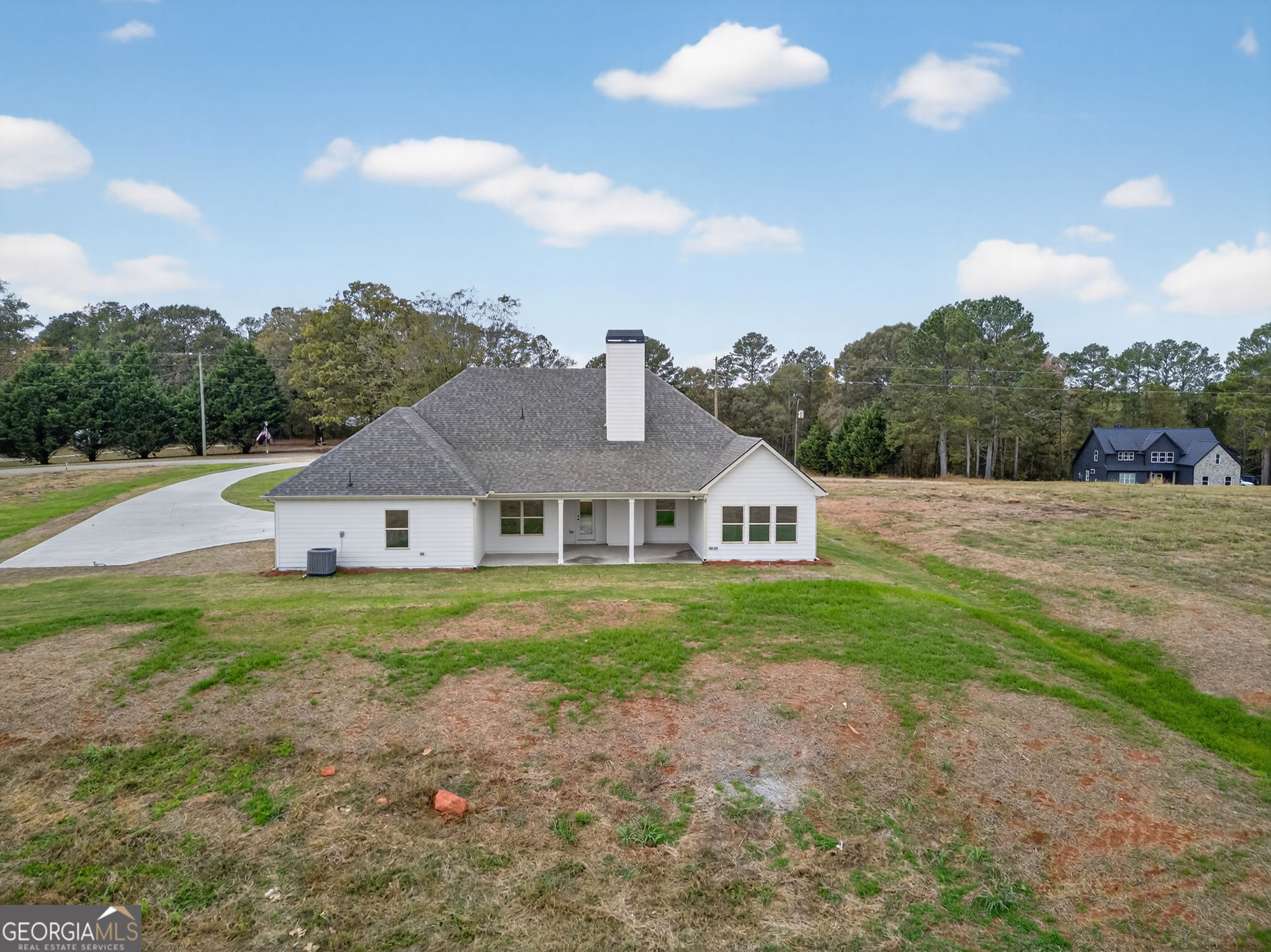 359 Gray Road Roopville, GA 30170 - Photo 44 of 46 a front view of a house with a yard and garage