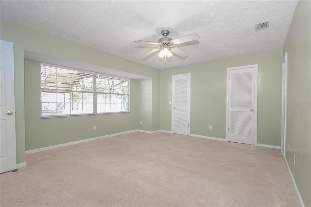 106 Phillips Drive Seffner, FL 33584 - Photo 22 of 48 a view of an empty room with a window