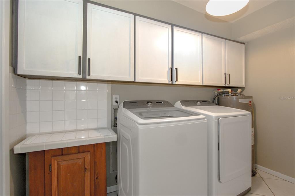 106 Phillips Drive Seffner, FL 33584 - Photo 37 of 48 a utility room with dryer and washer