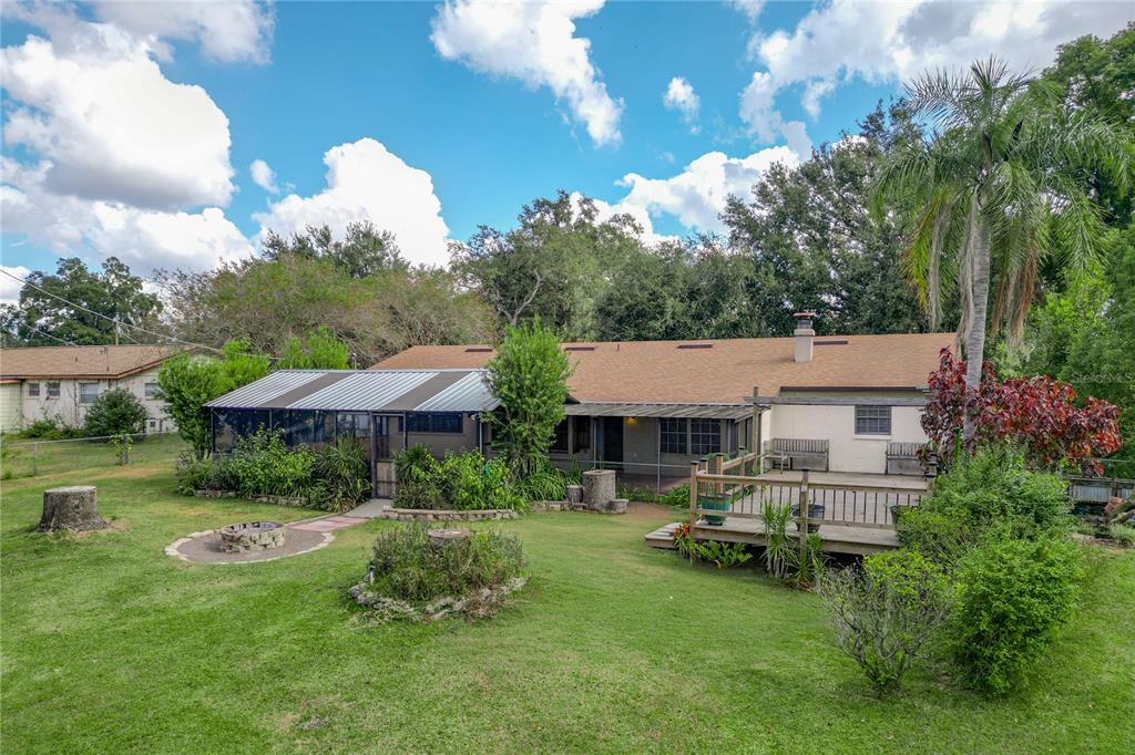 106 Phillips Drive Seffner, FL 33584 - Photo 48 of 48 a view of a house with a yard and sitting area