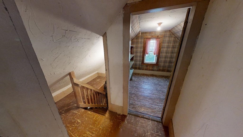 11 River Road Templeton, MA 01436 - Photo 18 of 32 a view of a hallway with wooden floor and staircase