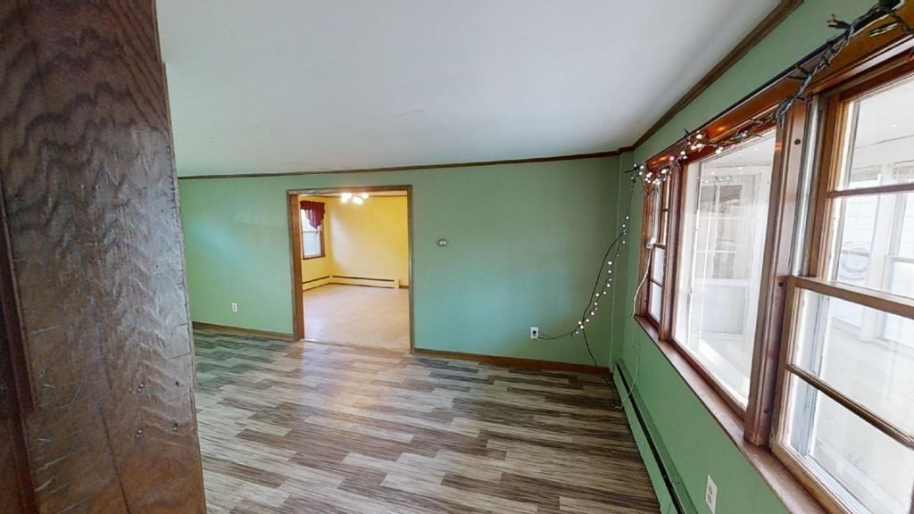 11 River Road Templeton, MA 01436 - Photo 5 of 32 a view of a big room with wooden floor and windows