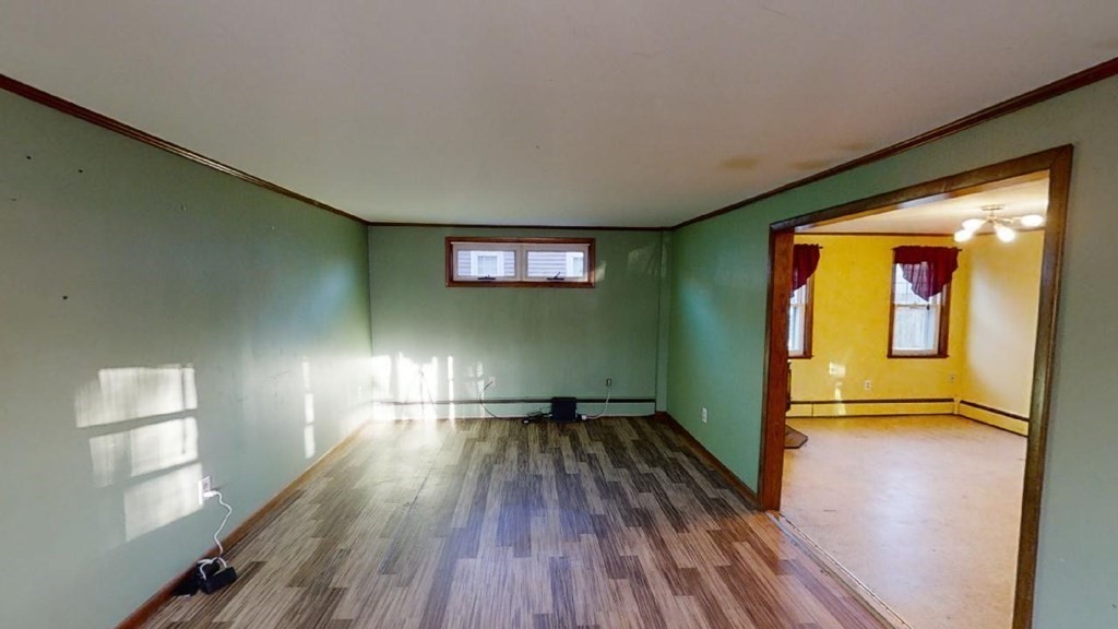 11 River Road Templeton, MA 01436 - Photo 7 of 32 a view of empty room with wooden floor and fan