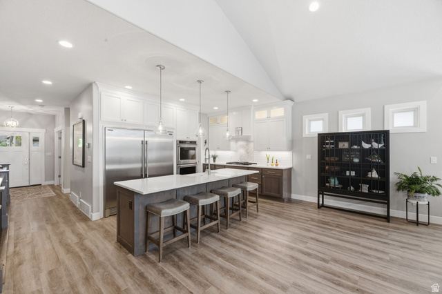 2109 Sunflower Lane Mapleton, UT 84664 - Photo 16 of 43 Gourmet Kitchen w/Gas Cooktop, Double Wall Oven, Extra Large Built-in Refrigerator/Freezer, Extra Long Island w/Farm Style Sink! Oversized Walk-in Pantry!
