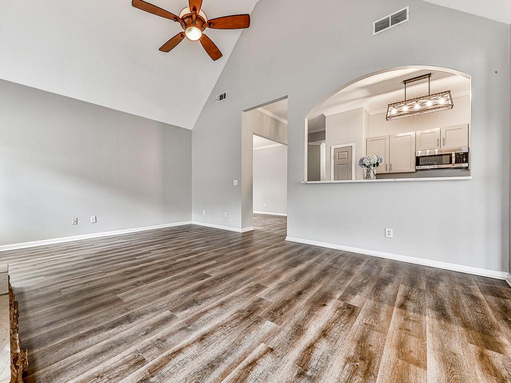 102 Springshade Court Canton, GA 30114 - Photo 12 of 78 a view of a room with wooden floor and white walls