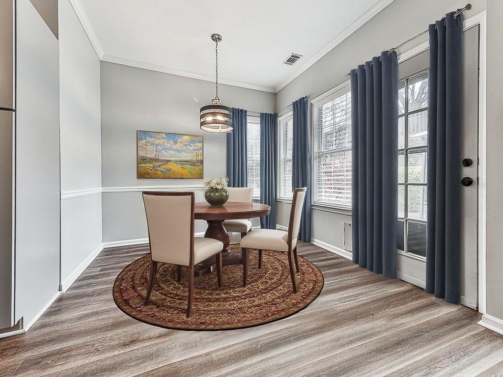 102 Springshade Court Canton, GA 30114 - Photo 15 of 78 a view of a dining room with furniture window and outside view