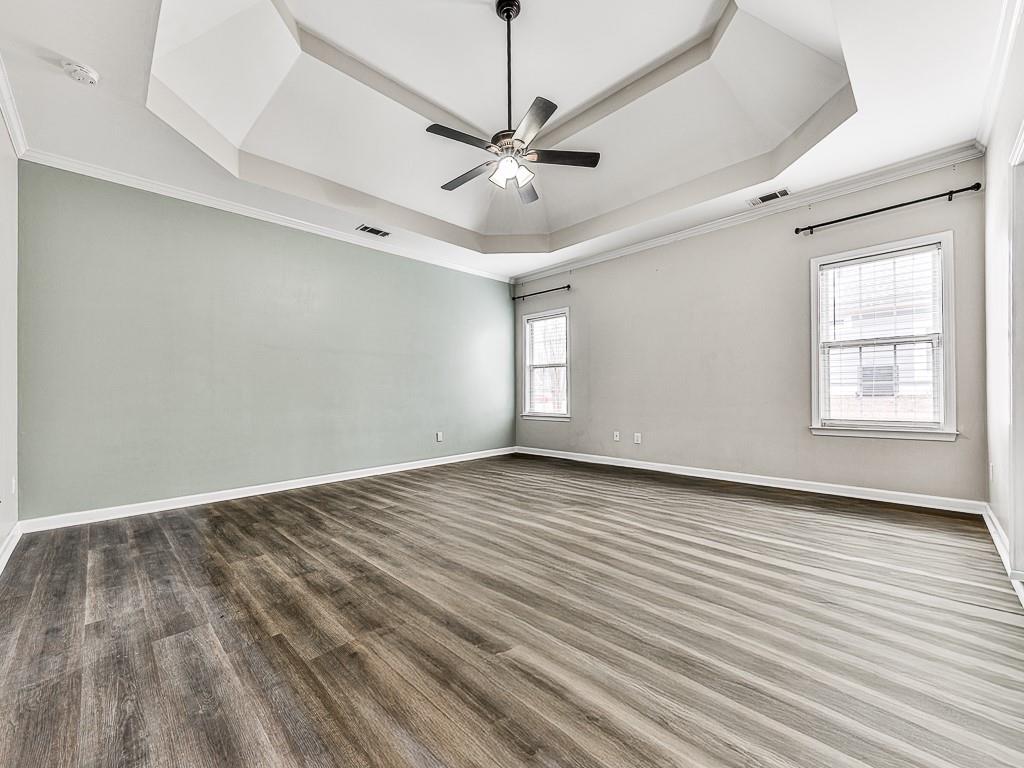 102 Springshade Court Canton, GA 30114 - Photo 25 of 78 a view of an empty room with wooden floor and a window