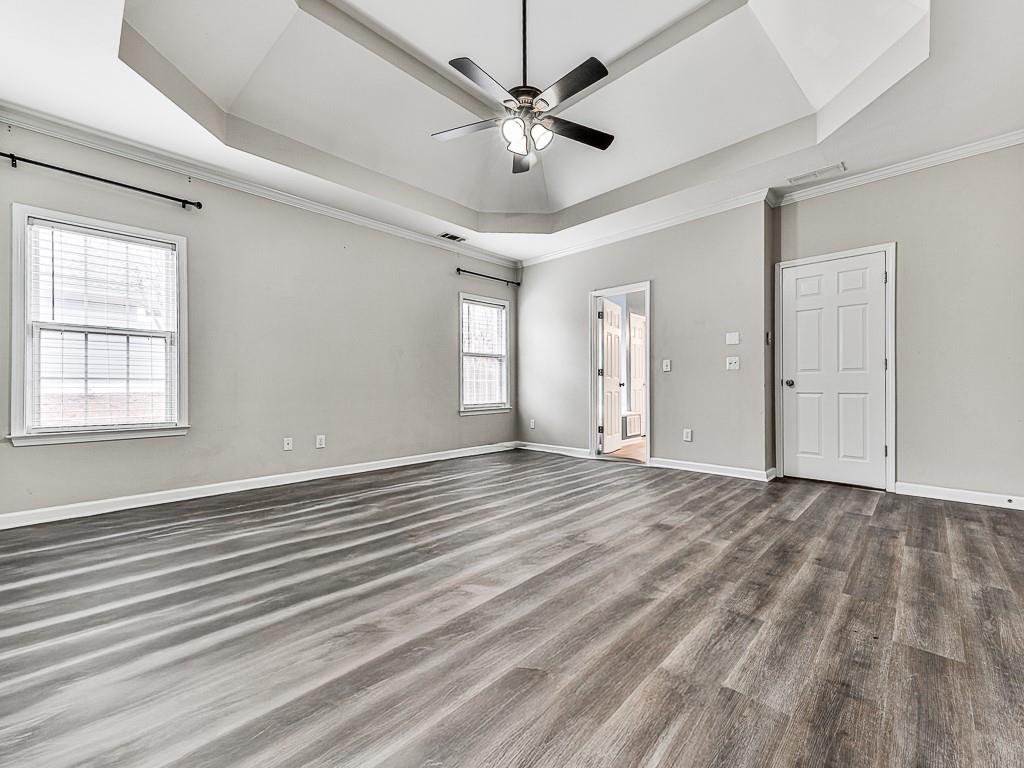 102 Springshade Court Canton, GA 30114 - Photo 26 of 78 a view of an empty room with window and a ceiling fan