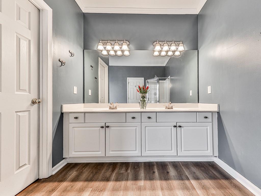 102 Springshade Court Canton, GA 30114 - Photo 27 of 78 a bathroom with a sink and a mirror