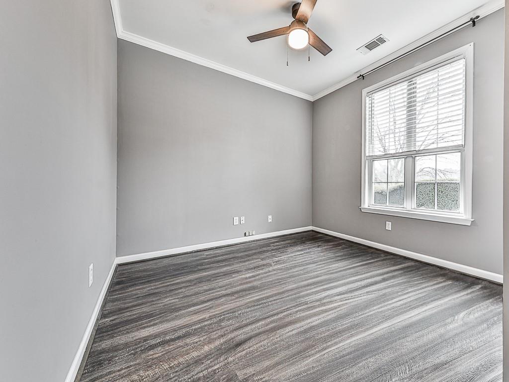 102 Springshade Court Canton, GA 30114 - Photo 3 of 78 wooden floor in an empty room with a window