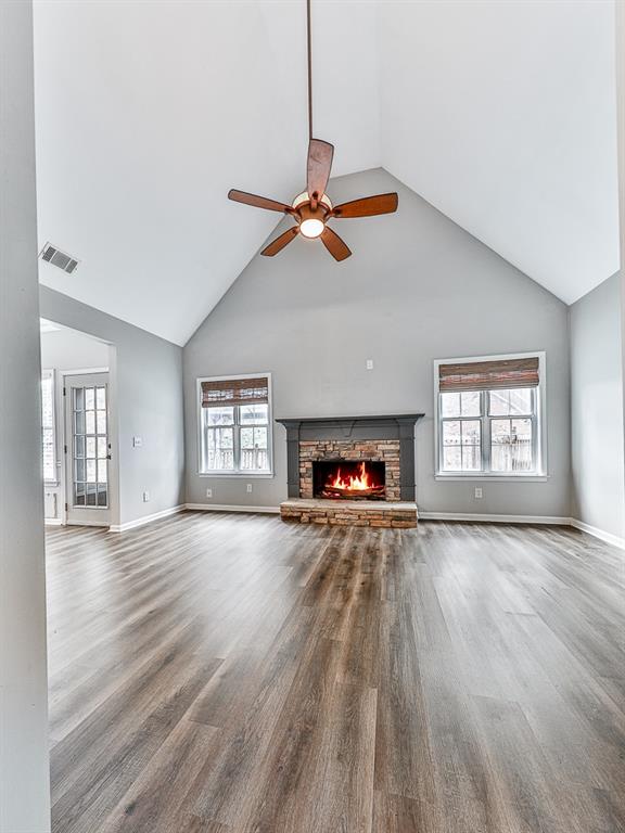 102 Springshade Court Canton, GA 30114 - Photo 31 of 78 wooden floor fireplace and windows in an empty room