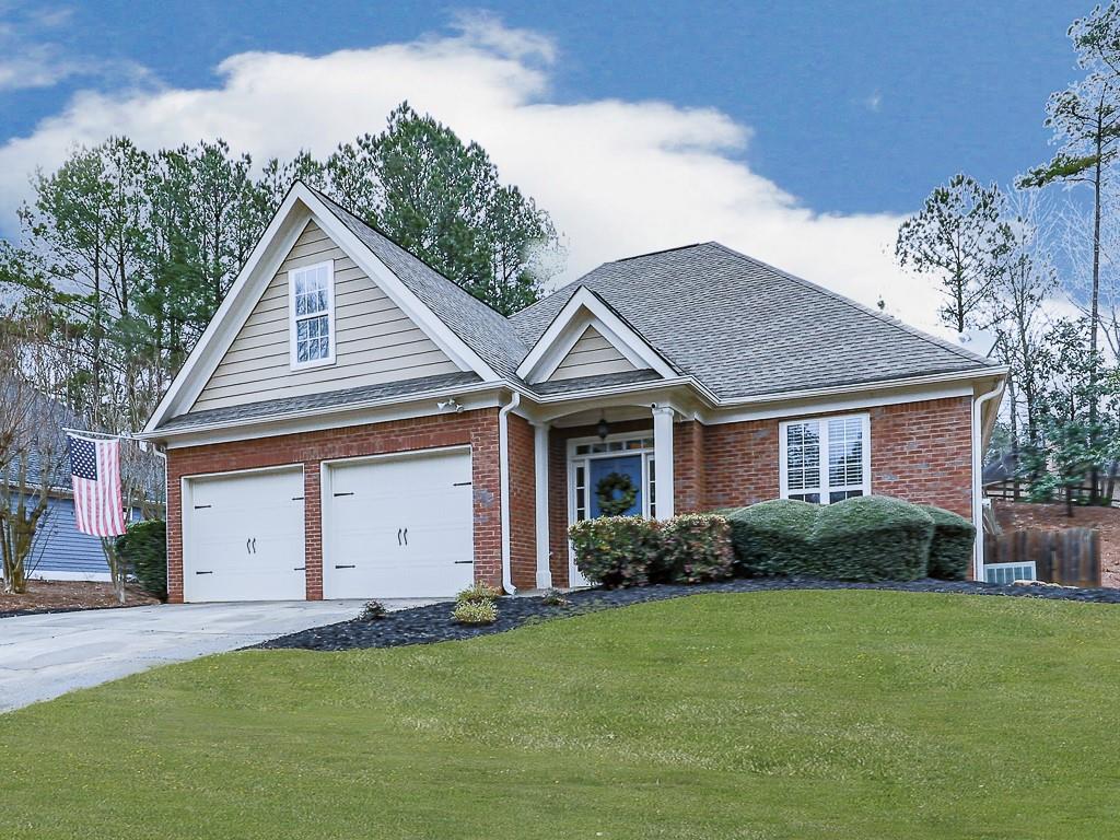 102 Springshade Court Canton, GA 30114 - Photo 42 of 78 a view of a house with a garden