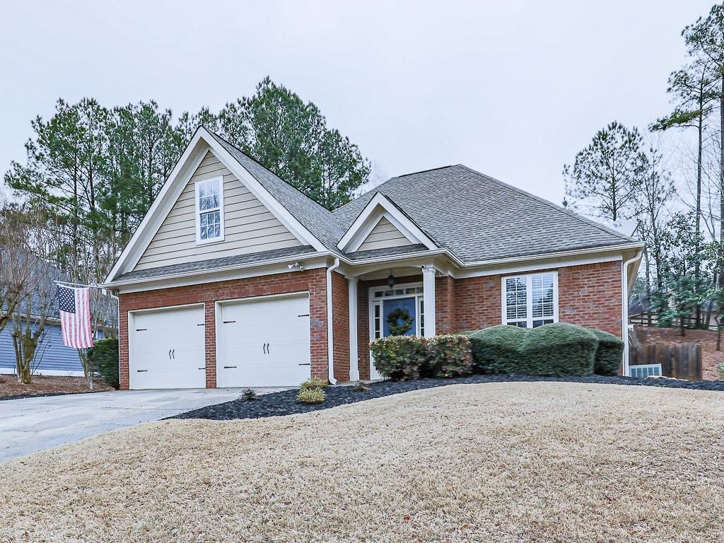 102 Springshade Court Canton, GA 30114 - Photo 43 of 78 a view of a house with a yard plants and large tree