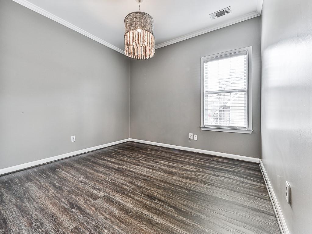 102 Springshade Court Canton, GA 30114 - Photo 6 of 78 a view of an empty room with wooden floor and a window