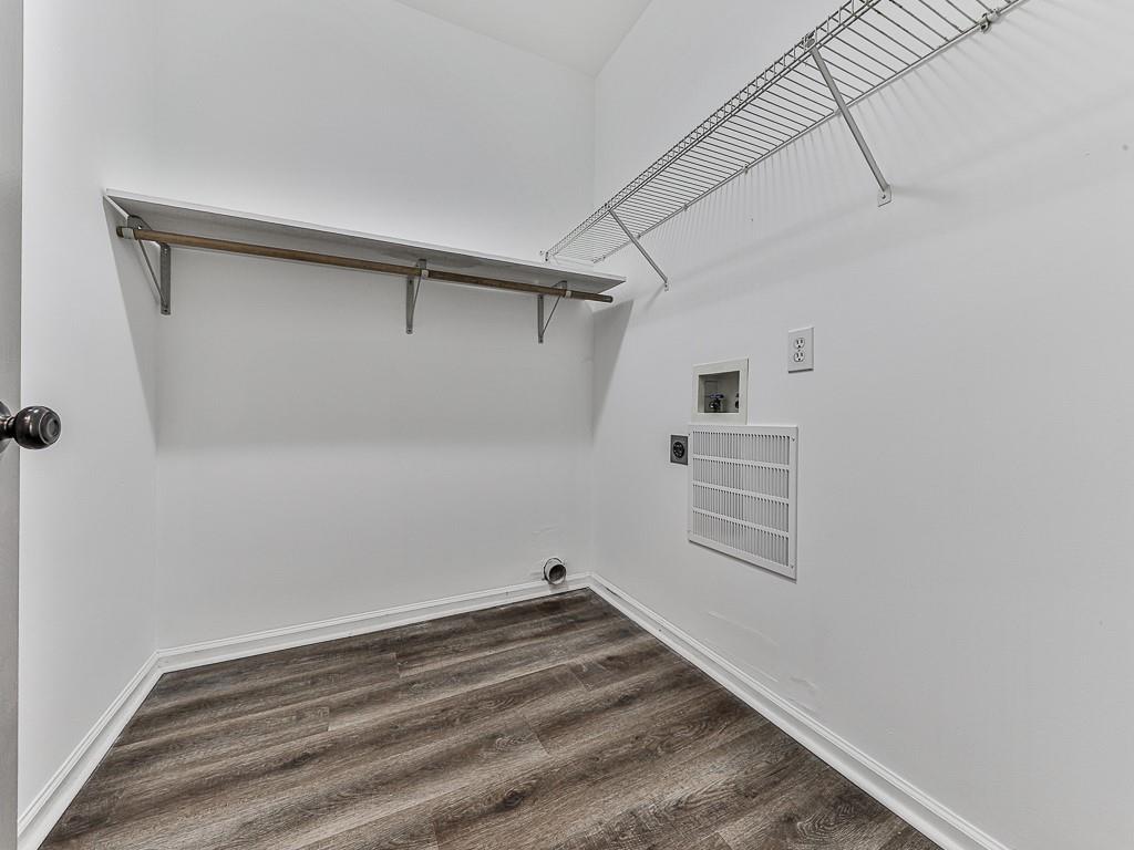 102 Springshade Court Canton, GA 30114 - Photo 7 of 78 a view of a room with racks on the wall