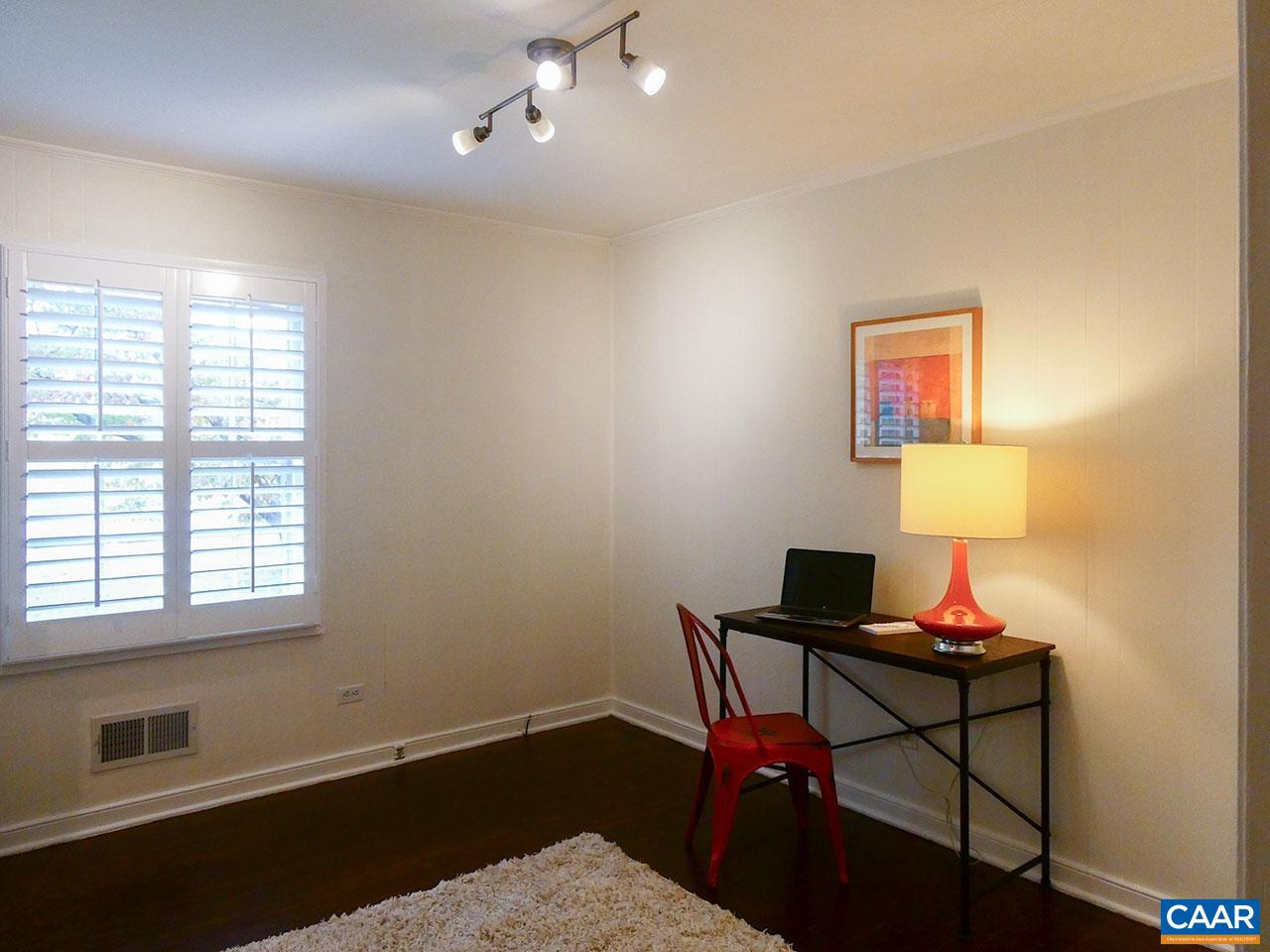 613 Shamrock Road Charlottesville, VA 22903 - Photo 17 of 42 a workspace with furniture and a window