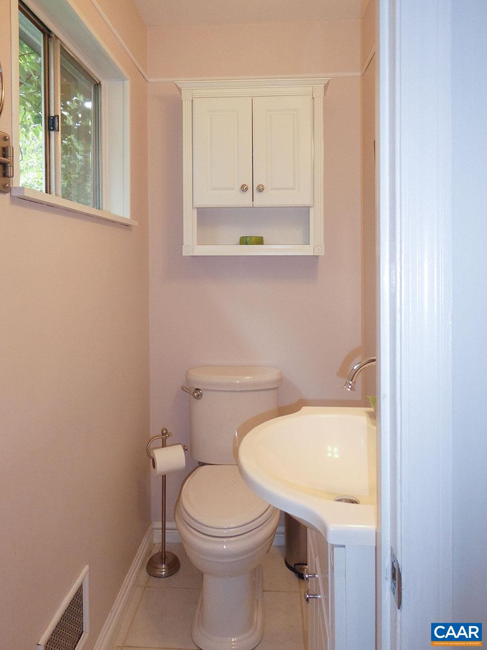 613 Shamrock Road Charlottesville, VA 22903 - Photo 25 of 42 a bathroom with a sink a toilet and a window
