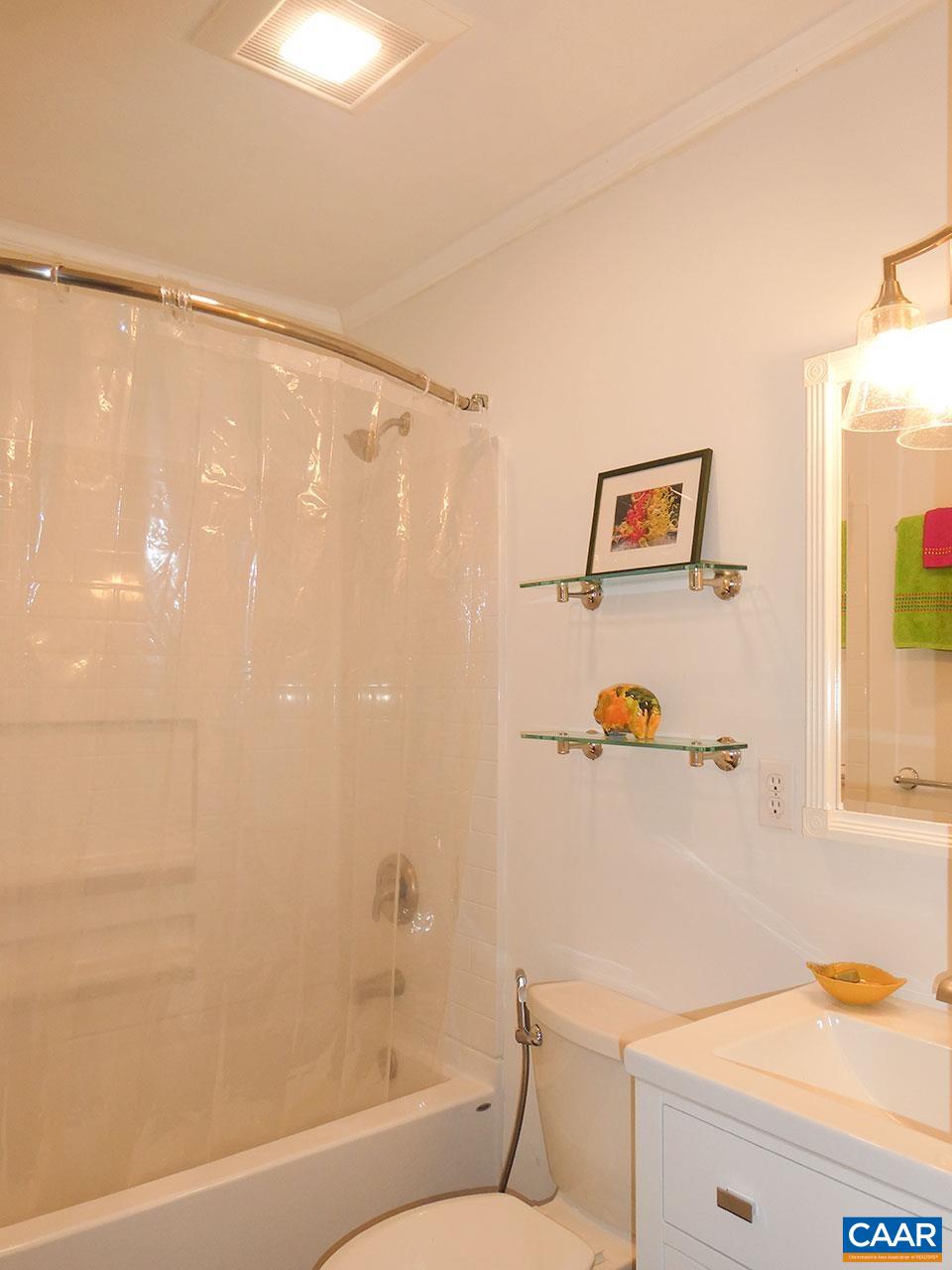 613 Shamrock Road Charlottesville, VA 22903 - Photo 27 of 42 a bathroom with a shower a toilet and a sink