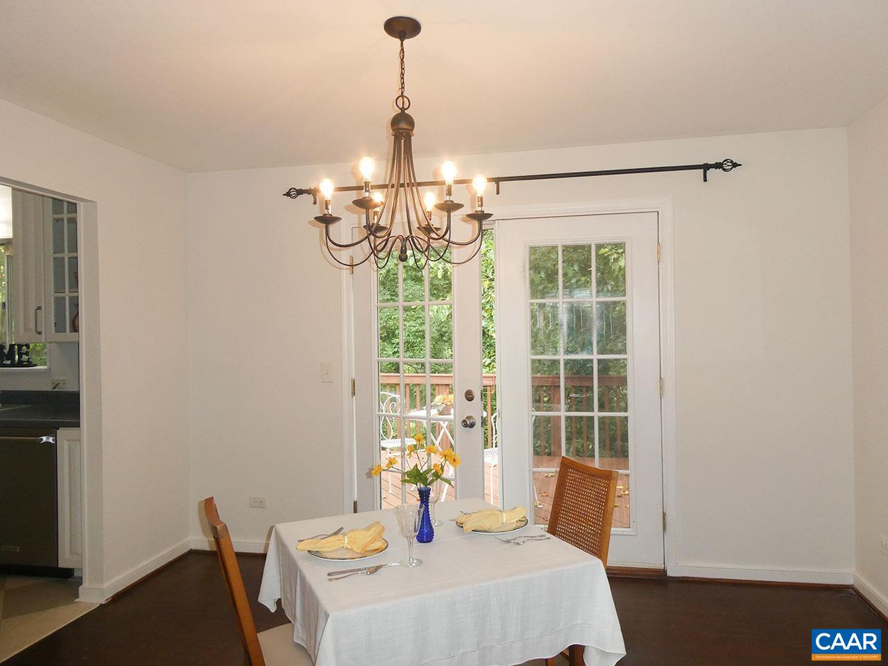 613 Shamrock Road Charlottesville, VA 22903 - Photo 6 of 42 a dining room with furniture and chandelier