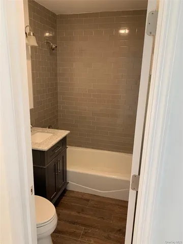 a bathroom with a sink and a toilet