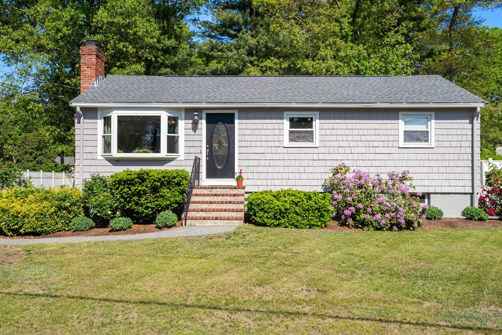 3 Norman Road Billerica, MA 01821 - Photo 1 of 28 a front view of a house with a garden