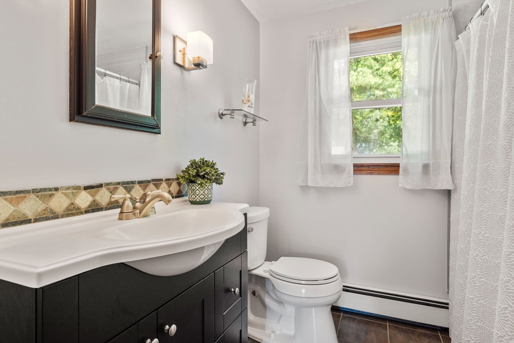3 Norman Road Billerica, MA 01821 - Photo 12 of 28 a bathroom with a sink vanity and a toilet