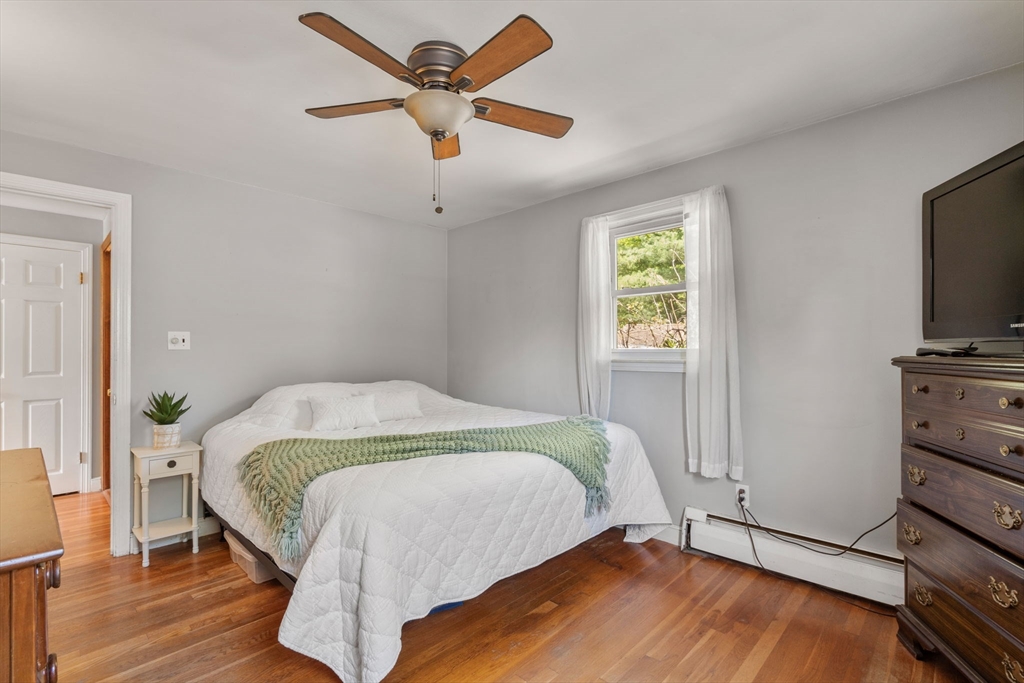 3 Norman Road Billerica, MA 01821 - Photo 14 of 28 a bedroom with a bed and a flat screen tv