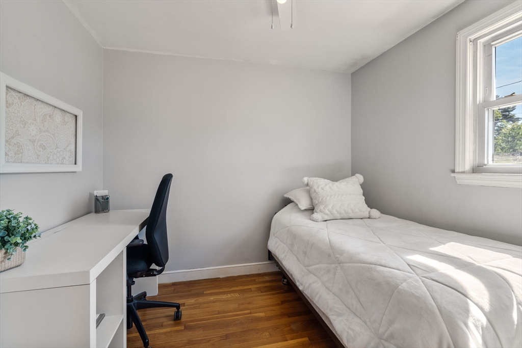 3 Norman Road Billerica, MA 01821 - Photo 16 of 28 a bedroom with a bed and a window