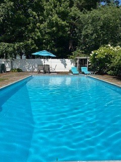3 Norman Road Billerica, MA 01821 - Photo 26 of 28 a view of a swimming pool with a patio