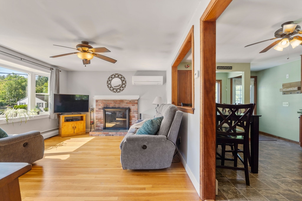 3 Norman Road Billerica, MA 01821 - Photo 7 of 28 a living room with furniture fireplace and window