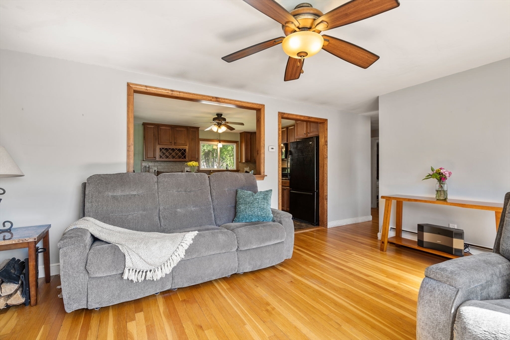 3 Norman Road Billerica, MA 01821 - Photo 9 of 28 a living room with furniture and a wooden floor