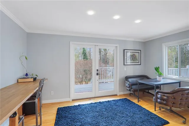 a workspace with furniture and a window