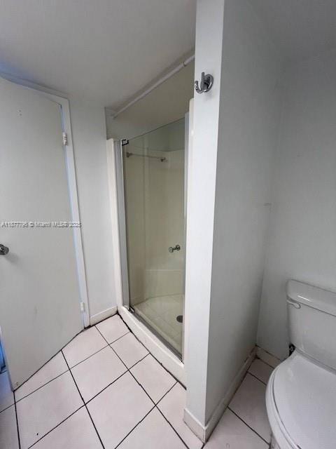 13499 Biscayne Boulevard, Unit 602 North Miami, FL 33181 - Photo 7 of 14 a bathroom with a shower and toilet