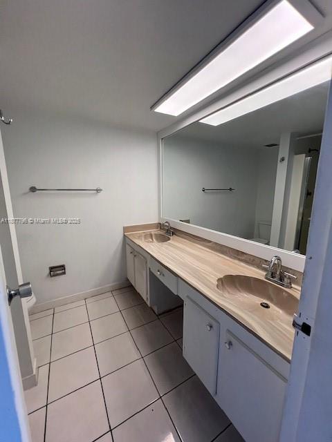 13499 Biscayne Boulevard, Unit 602 North Miami, FL 33181 - Photo 8 of 14 a bathroom with a sink a mirror and a shower