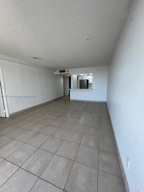 13499 Biscayne Boulevard, Unit 602 North Miami, FL 33181 - Photo 10 of 14 an empty room with windows