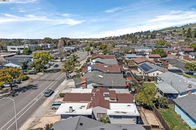 an aerial view of a city with lots of residential buildings