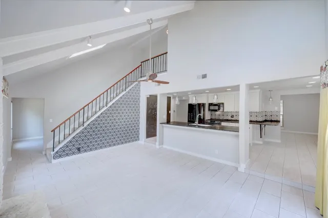 a view of a livingroom with furniture and a livingroom