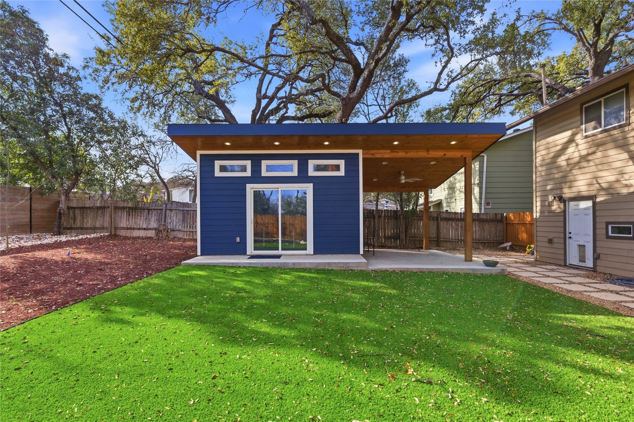 501 Lightsey Road Austin, TX 78704 - Photo 2 of 40 a view of a house with a yard and sitting area