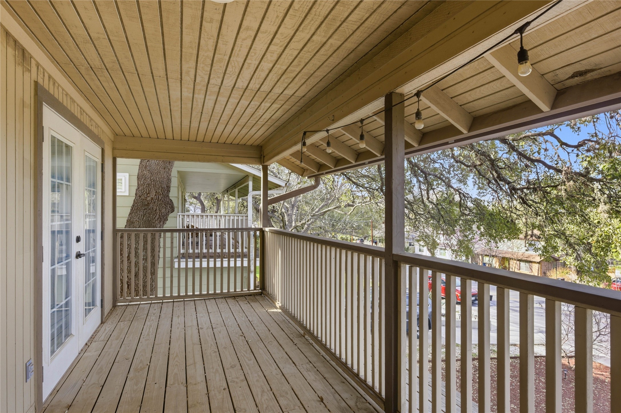 501 Lightsey Road Austin, TX 78704 - Photo 24 of 40 a view of a porch with wooden floor