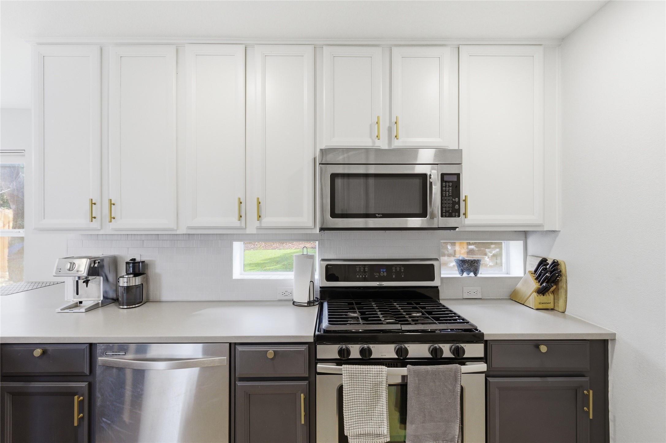 501 Lightsey Road Austin, TX 78704 - Photo 8 of 40 a kitchen with cabinets and appliances
