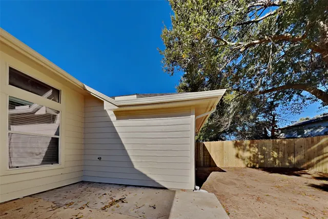 a view of a back yard of the house
