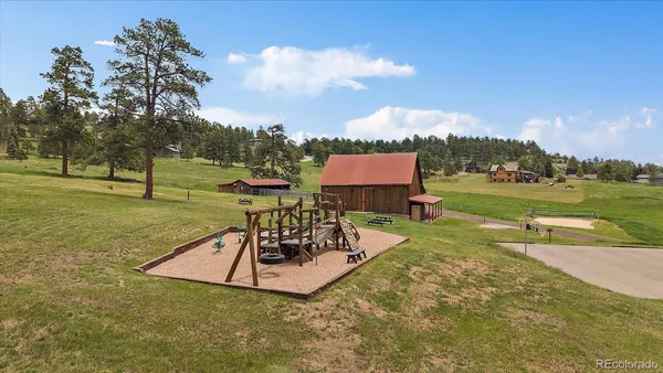 an outdoor space with patio swimming pool and outdoor seating