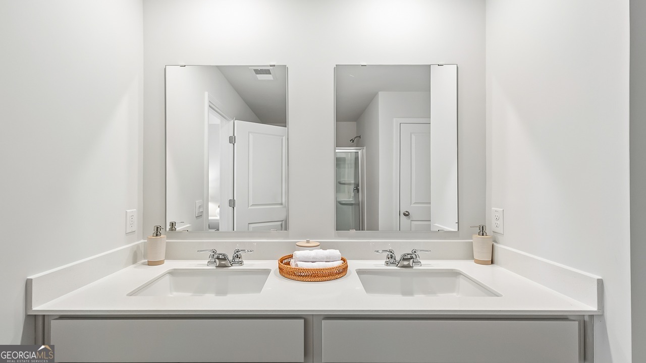 266 Pasture Lane Statesboro, GA 30461 - Photo 15 of 19 a bathroom with a sink and a mirror