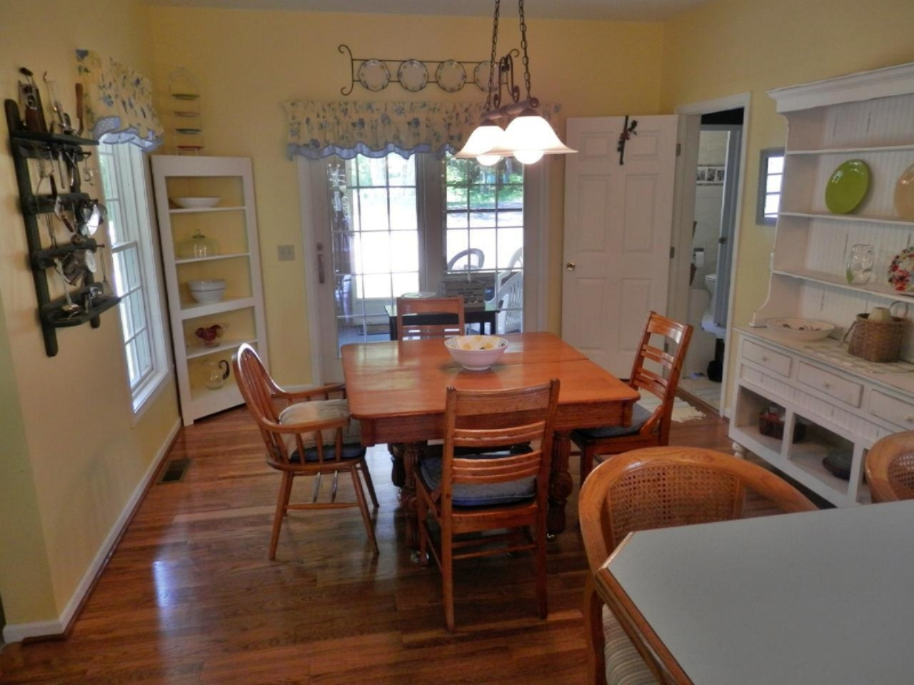 22296 Benton Road Mesick, MI 49668 - Photo 12 of 56 Dining area with beautiful wood floor