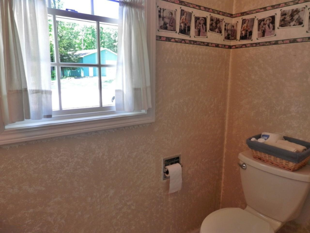 22296 Benton Road Mesick, MI 49668 - Photo 19 of 56 Half bath on main floor by garage