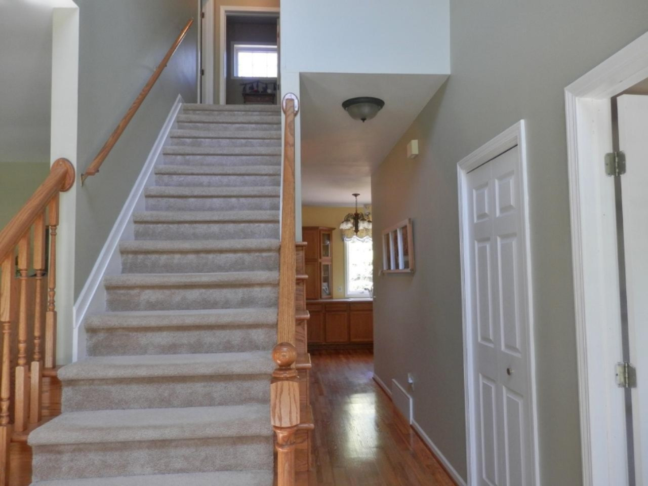 22296 Benton Road Mesick, MI 49668 - Photo 22 of 56 Oak staircase leading upstairs