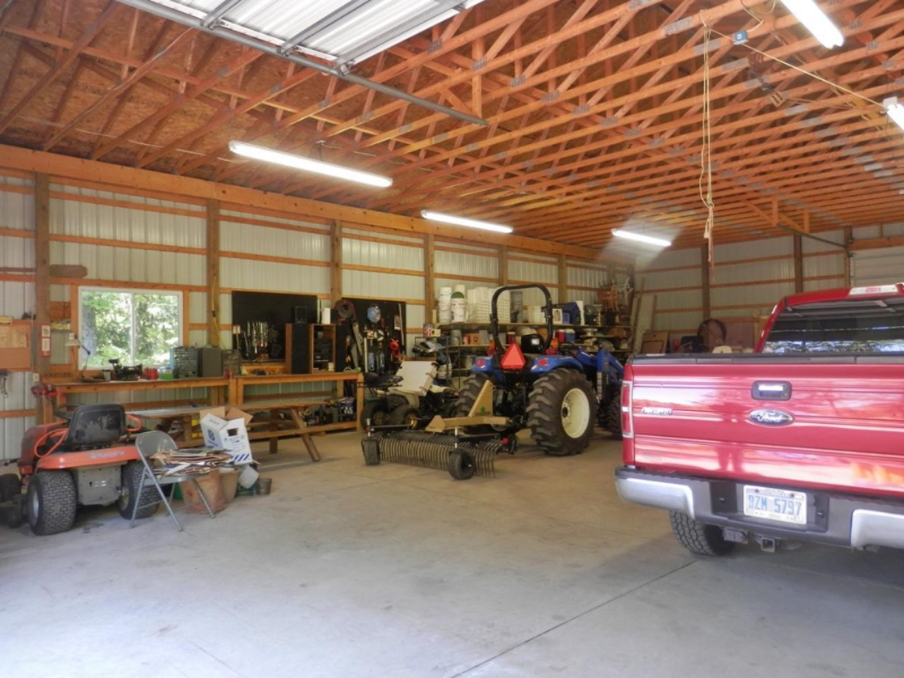 22296 Benton Road Mesick, MI 49668 - Photo 46 of 56 14 ft sidewalls with windows